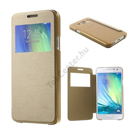 Samsung Galaxy A3 (SM-A300F) Műanyag telefonvédő (bőr flip, oldalra nyíló, S-View cover, szálcsiszolt mintázat) ARANY