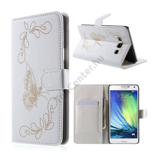 Samsung Galaxy A7 (SM-A700F) Tok álló, bőr (FLIP, oldalra nyíló, asztali tartó funkció, gravírozott, pillangó minta) FEHÉR