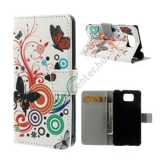 Samsung Galaxy Alpha (SM-G850) Tok álló, bőr (FLIP, mágneses, oldalra nyíló, bankkártya tartó, asztali tartó funkció, pillangó, körminta) FEHÉR