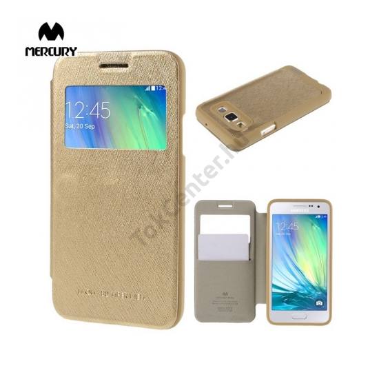 Samsung Galaxy A3 (SM-A300F) MERCURY Wow Bumper tok álló, bőr (FLIP, oldalra nyíló, S-View cover, textilminta) ARANY
